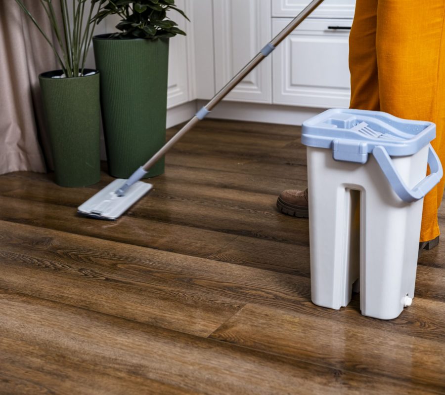 cleaning-the-wood-floor-with-a-mop-2026-03-27-01-33-54-utc